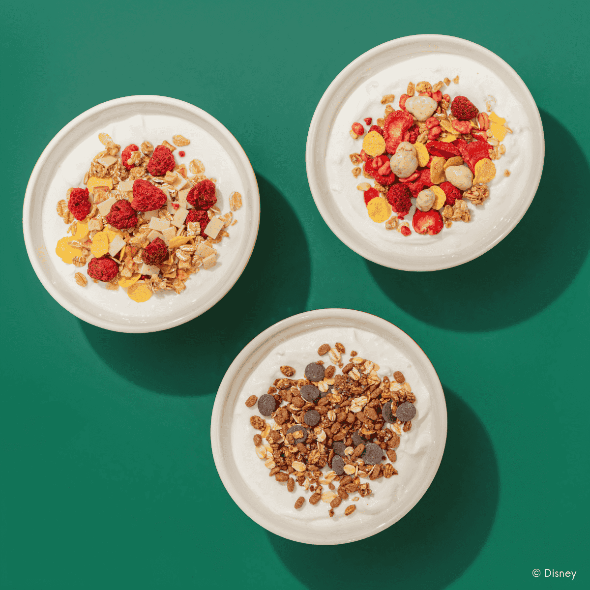 mymuesli Disney Mini Geschenkset mit bunten Probierportionen und Disney-Charakteren.