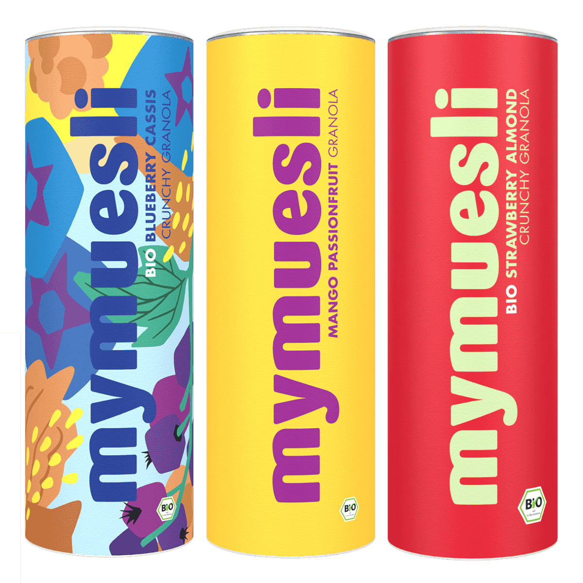 Drei farbenfrohe mymuesli -Dosen (Blau gemustert, Gelb und Rot) stehen nebeneinander vor einem dunkelgrünen Hintergrund.
