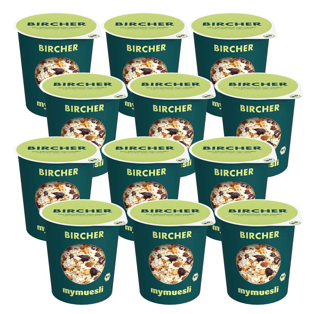 Elf dunkelgrüne mymuesli Portionsbecher der Sorte „Bircher Müsli“ sind in mehreren Reihen ordentlich aufgestellt.