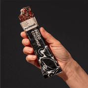 mymuesli Bio Paleo Coconut Müsliriegel an der Ecke abgebissen